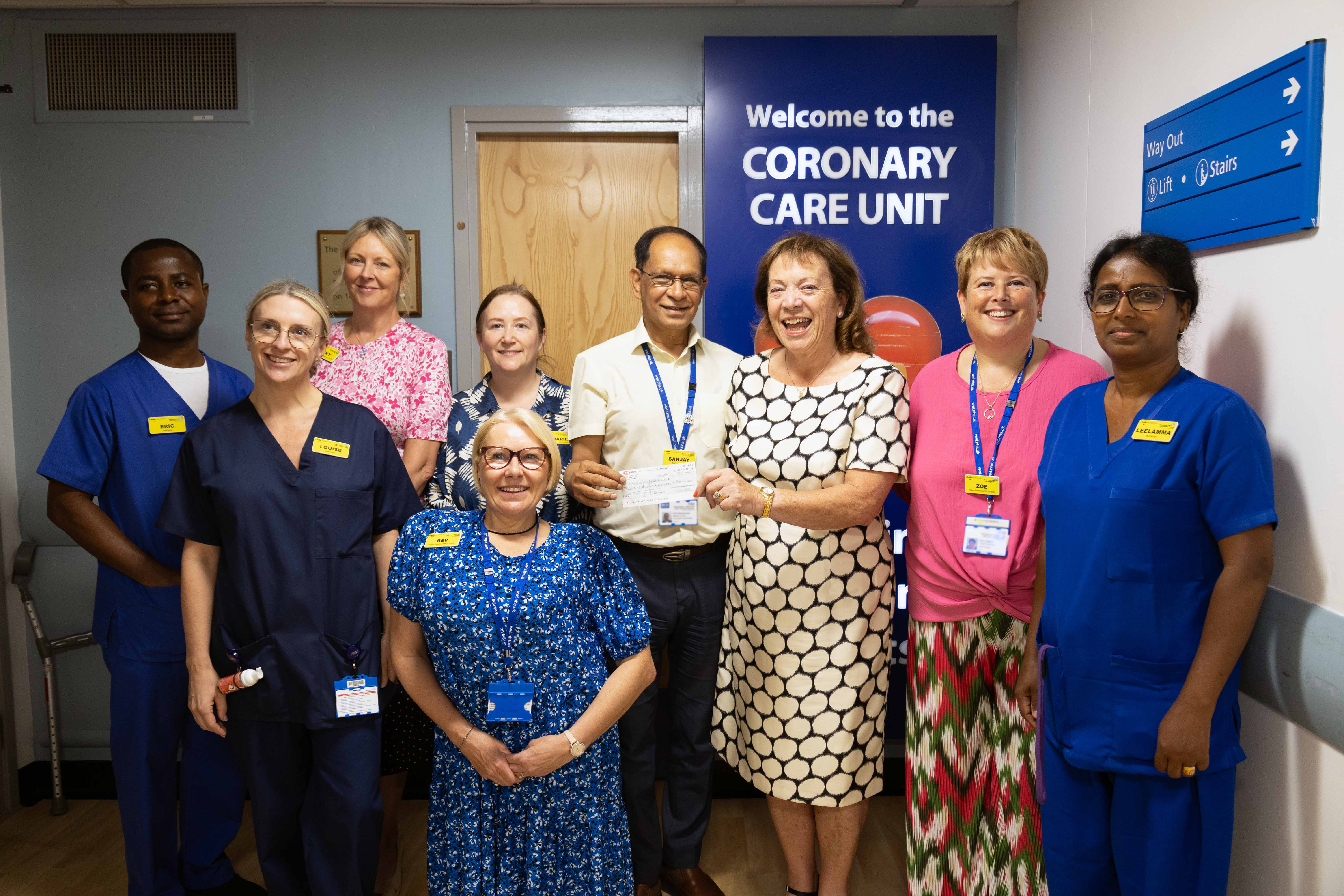 Catherine Duckett with Sanjay Arya and CCU colleagues sml